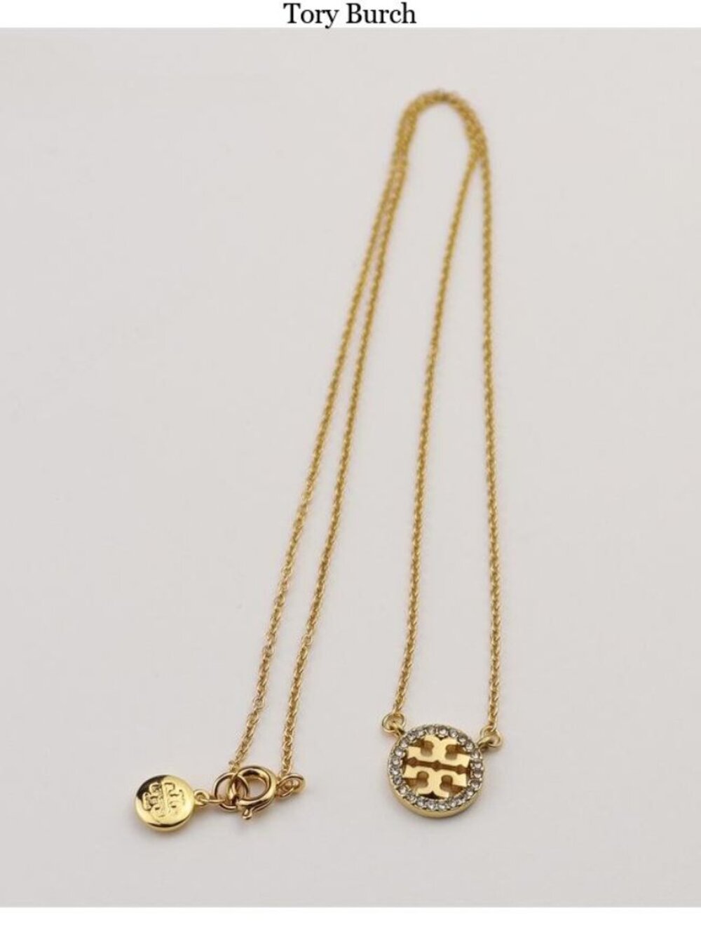 Tory Burch Gold Logo Pendant Necklace with Crystal Halo